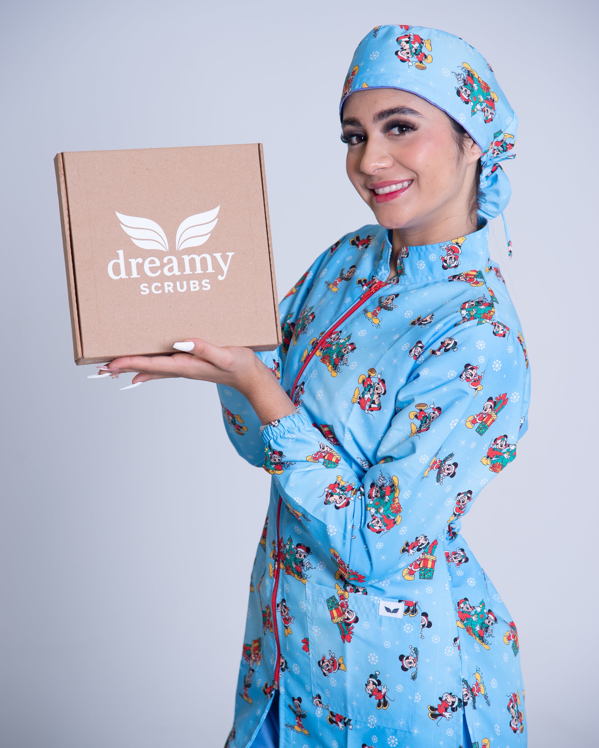 Bata médica premium antifluido holiday Dreamy Scrubs